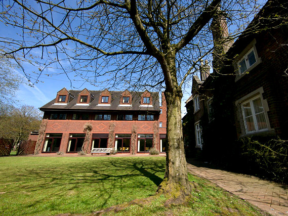 The attractive gardens and exterior