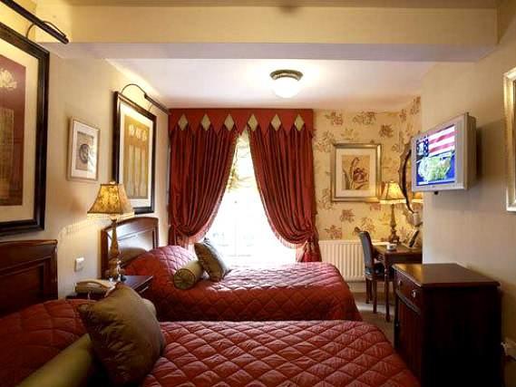 A twin room at Opulence Central London is perfect for two guests