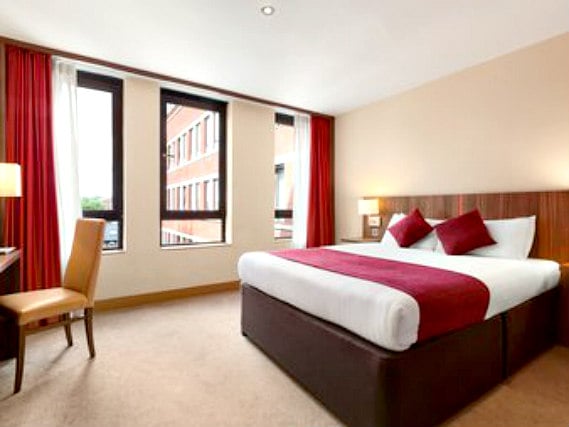 Get a good night's sleep in your comfortable room at Ramada by Wyndham Hounslow Heathrow East
