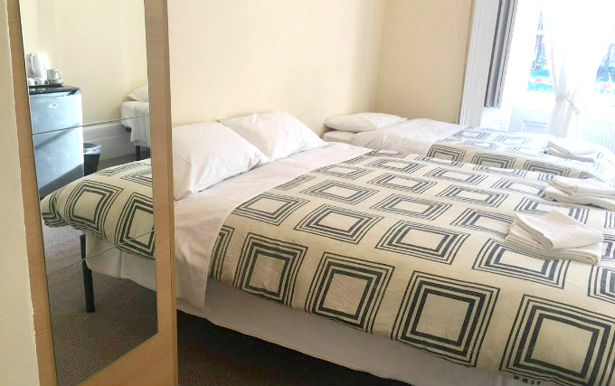 A typical triple room at Andrews House Hotel