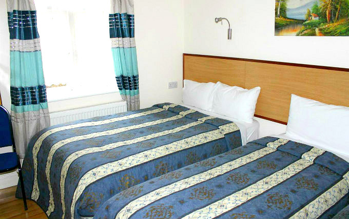 A typical triple room at Apollo Hotel London