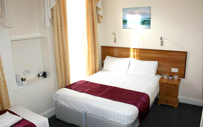 A triple room at Apollo Hotel London