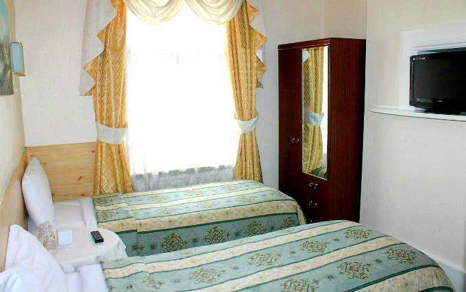 A typical twin room at Apollo Hotel London