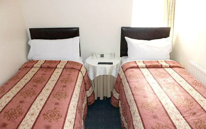 A twin room at Apollo Hotel London