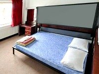 A typical double room at Equity Point Hostel
