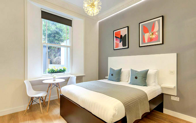 A comfortable double room at Monocrown London Studios