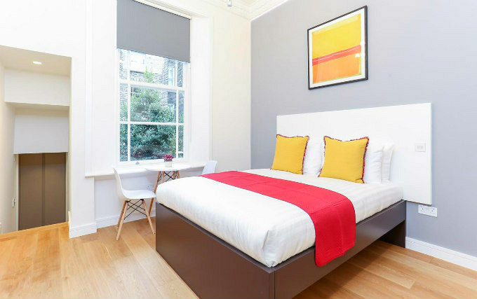 A comfortable double room at Monocrown London Studios