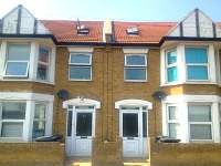 The friendly exterior of Rooms For You 