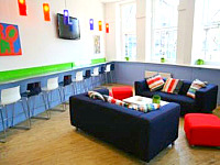 The living area at Journeys Brighton Hostel - sylish and clean