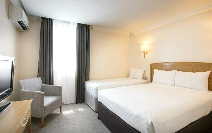 A comfortable triple room at Thistle Hotel Heathrow