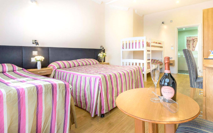 A typical triple room at The Athena Hotel