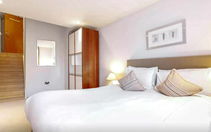 A comfortable double room at Somerset Kensington Gardens Apartments