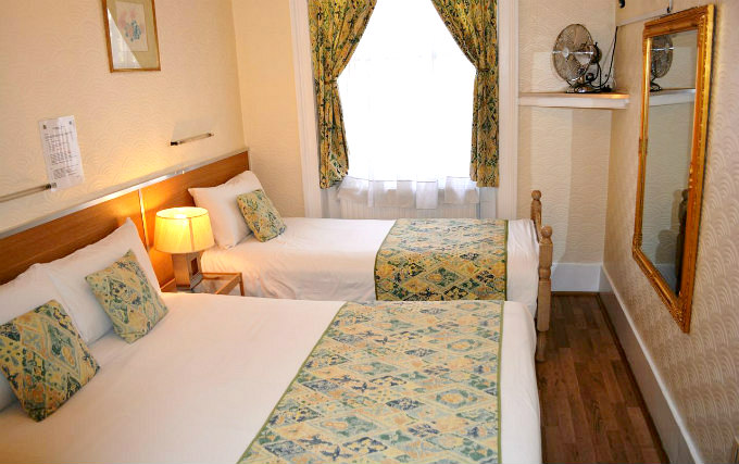 A typical triple room at Falcon Hotel London