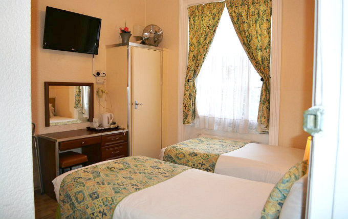 A twin room at Falcon Hotel London