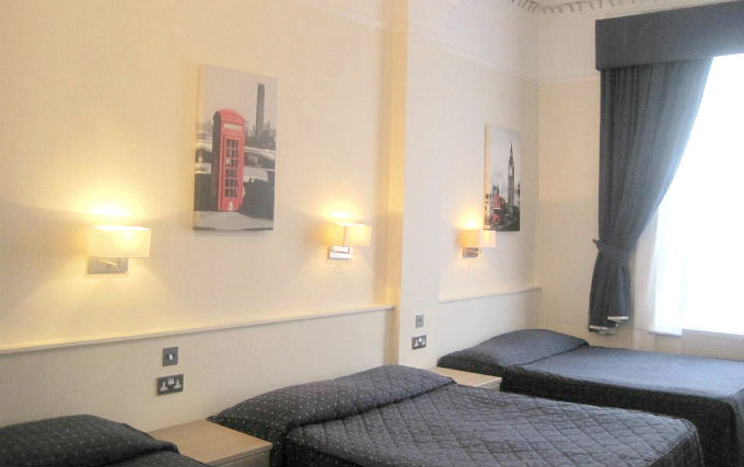 A typical quad room at Aaraya Hotel London