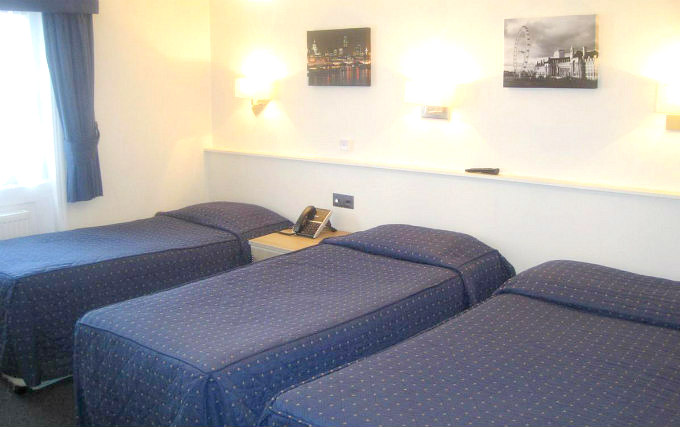 A typical triple room at Aaraya Hotel London