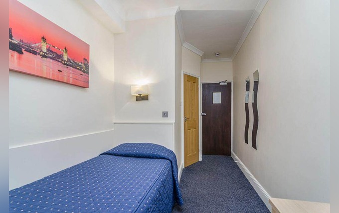 A typical single room at Aaraya Hotel London