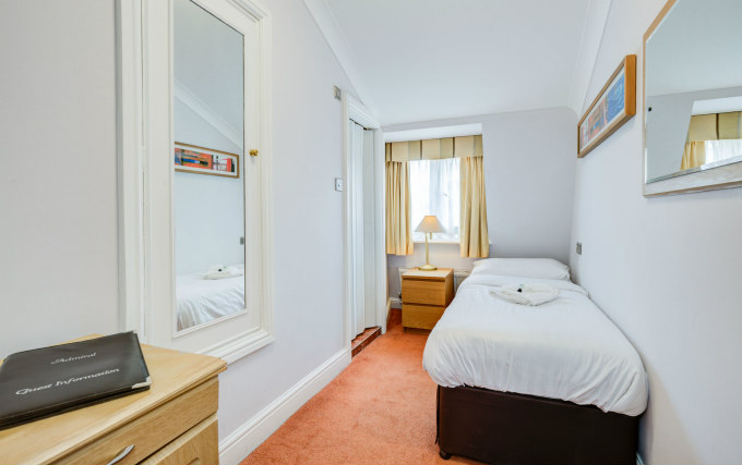A comfortable single room at The Admiral Hotel