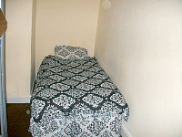 Bed in room with Bunk Beds