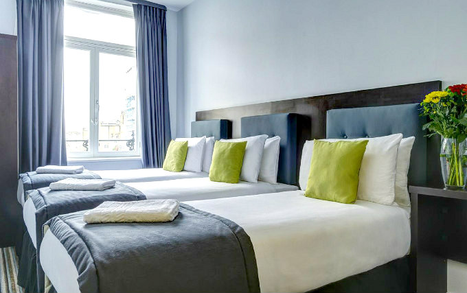 A typical triple room at Grand Tourist Hotel