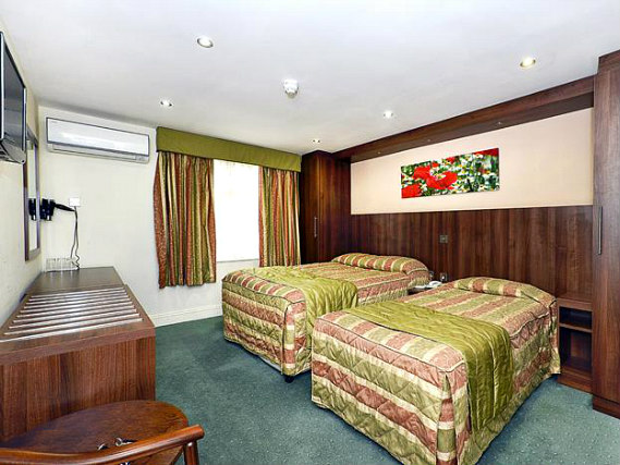 A twin room at Hotel Oliver is perfect for two guests