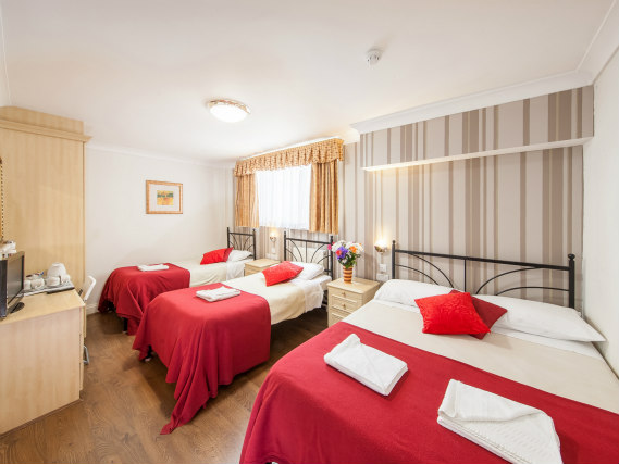 Get a good night's sleep in your comfortable room at Fairway Hotel London