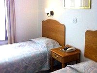 A typical twin room at Abbey Hotel London