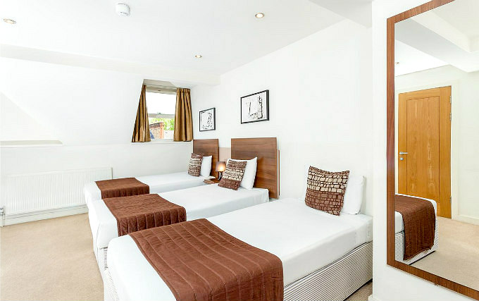 A typical triple room at Avni Kensington Hotel