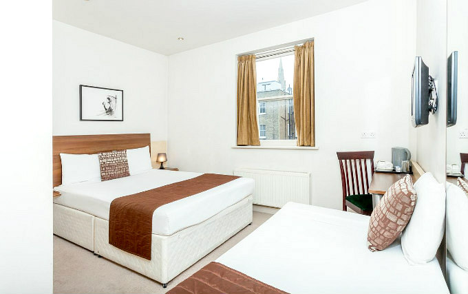 A comfortable triple room at Avni Kensington Hotel