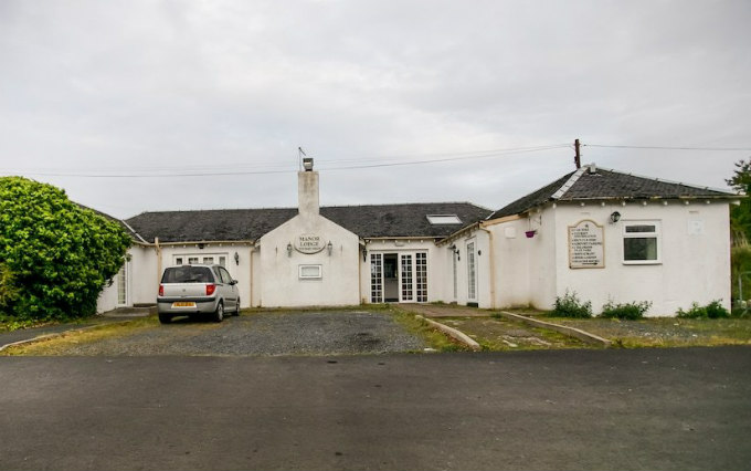 An exterior view of Manor Park Hotel