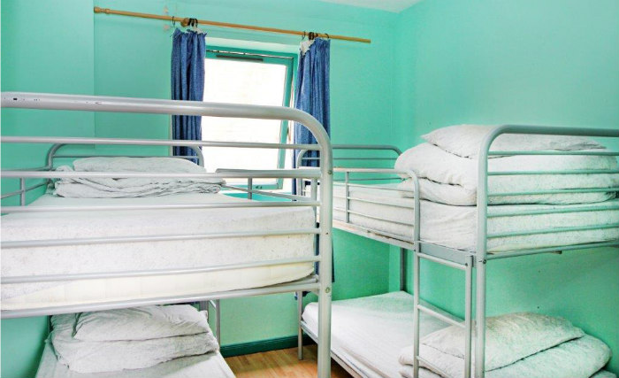 Rest easy in a comfortable bed in your room