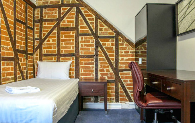 A comfortable single room at Heathrow Lodge