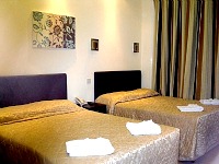 A quad room at Craven Hotel