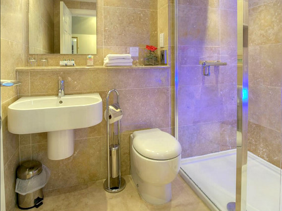 Relax in the private bathroom in your room