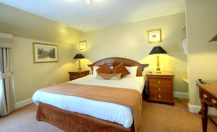 Rest easy in a comfortable bed in your room