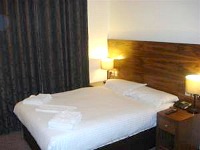 A Typical Bedroom at the Alexander Thomson Hotel