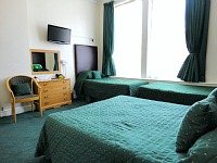 A Typical Family Bedroom at London Town Hotel