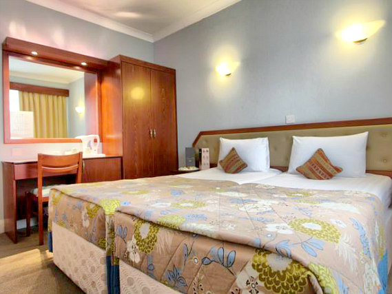 Enjoy a hot drink thanks to the tea/coffee making facilities in your room at St George Hotel