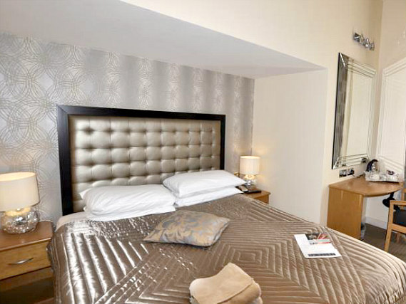 Rest easy in a comfortable bed in your room at Duke of Leinster Hotel
