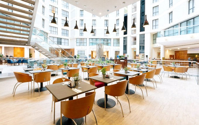 Relax and enjoy your meal in the Dining hall at Sofitel Gatwick