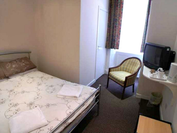 Put your feet up in front of the TV in your room