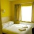Acton Town Hotel Bedroom