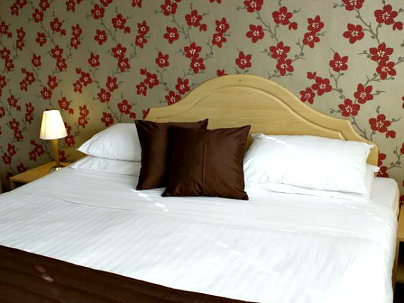 Get a good night's sleep in your comfortable room at The Brent Hotel