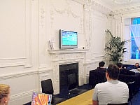 Sky TV and comfy surroundings in the television Lounge at Hyde Park Hostel