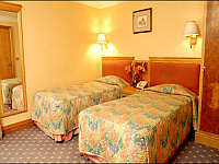 A Twin Room With Marble Bathroom at Grange Langham Court