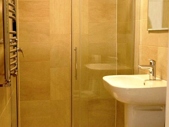 Relax in the private bathroom in your room