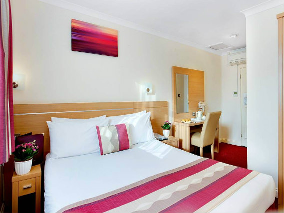 Get a good night's sleep in your comfortable room at Queens Park Hotel