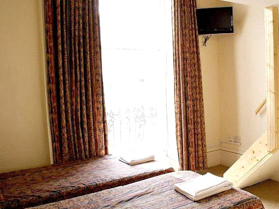 A twin room at Palace Court Hotel London is perfect for two guests