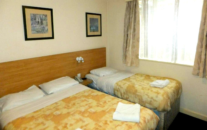 A triple room at Colliers Hotel