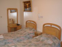 A twin room at Exhibiton Court Hotel 4